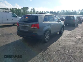 2012 Kia Sorento LX with VIN 5XYKT3A19CG283778, listed as a IAAI auction lot 42259689 with 211,493 mi miles and . Bid and sale history available at DreamBid. Image 4.