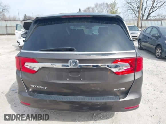 2018 Honda Odyssey Touring with VIN 5FNRL6H83JB008463, listed as a IAAI auction lot 41805044 with 65,001 mi miles. Bid and sale history available at carsss.com. Image 16.