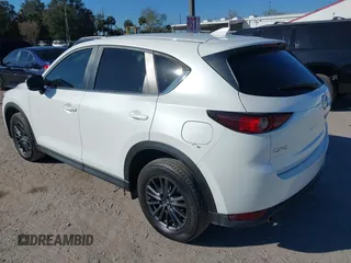 2020 Mazda CX-5 Touring with VIN JM3KFACM6L0737727, listed as a IAAI auction lot 41283200 with 85,949 mi miles and . Bid and sale history available at carsss.com. Image 3.
