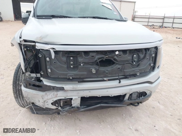 2023 Ford F-150 Lightning Pro with VIN 1FTVW1EL7PWG19070, listed as a IAAI auction lot 41536193 with 22,654 mi miles. Bid and sale history available at carsss.com. Image 20.