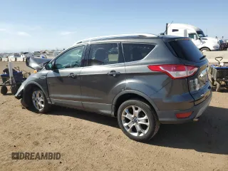 2016 Ford Escape Titanium with VIN 1FMCU9J96GUC63384, listed as a Copart auction lot 52255725 with 136,869 mi miles and Salvage Title. Bid and sale history available at carsss.com. Image 2.