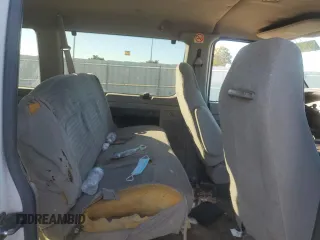 2002 Ford Econoline Passenger XL with VIN 1FBSS31S82HB36096, listed as a Copart auction lot 80654574 with 170,656 mi miles and Salvage title. Bid and sale history available at DreamBid. Image 12.