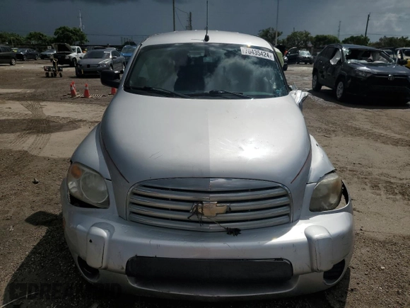 2011 Chevrolet HHR LS z VIN 3GNBAAFW7BS560592, wystawiony jako Copart lot #70435424 z przebiegiem Nie podano mil oraz Szkoda całkowita • Salvage title. Historia ofert i sprzedaży dostępna na DreamBid. Obrazek 5.