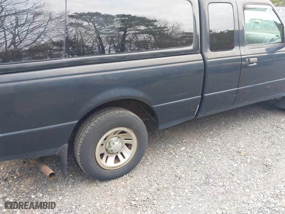 1999 Ford Ranger XL with VIN 1FTYR14V5XPB00021, listed as a IAAI auction lot 41899747 with 180,954 mi miles. Bid and sale history available at carsss.com. Image 6.