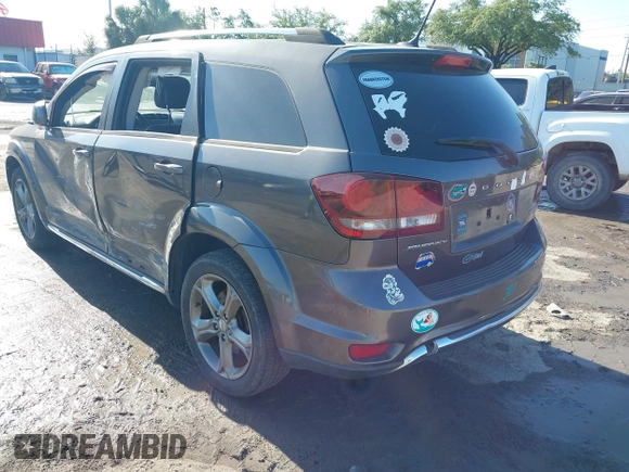2016 Dodge Journey Crossroad Plus z VIN 3C4PDCGB0GT209506, wystawiony jako IAAI lot #42044055 z przebiegiem 93 115 mil mil oraz . Historia ofert i sprzedaży dostępna na DreamBid. Obrazek 3.