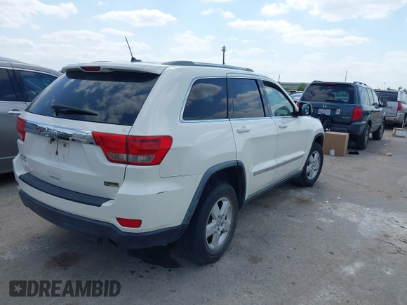 2011 Jeep Grand Cherokee 70th Anniversary with VIN 1J4RR4GG4BC562003, listed as a IAAI auction lot 42022419 with 231,786 mi miles. Bid and sale history available at carsss.com. Image 4.