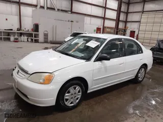 2003 Honda Civic LX with VIN 2HGES16573H598145, listed as a IAAI auction lot 41651885 with 254,523 mi miles. Bid and sale history available at carsss.com. Image 2.