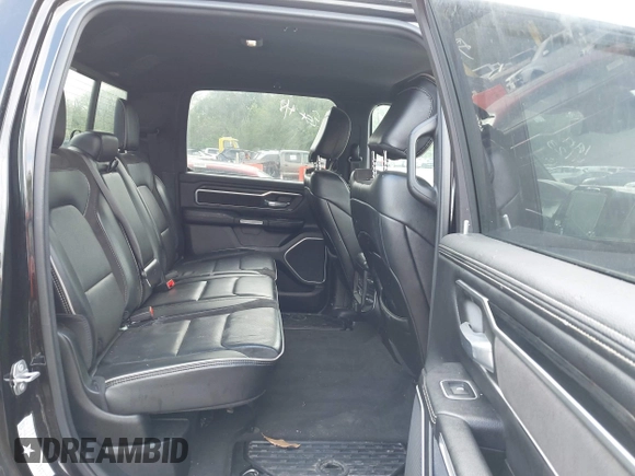 2023 Ram 1500 Laramie with VIN 1C6SRFJTXPN541328, listed as a IAAI auction lot 42121615 with 61,939 mi miles and . Bid and sale history available at DreamBid. Image 8.