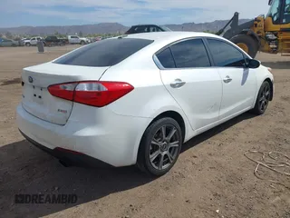 2014 Kia Forte EX with VIN KNAFX4A89E5232153, listed as a IAAI auction lot 41902512 with 133,978 mi miles. Bid and sale history available at carsss.com. Image 4.