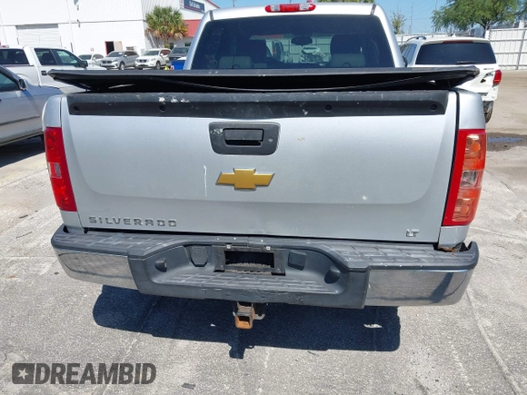 2013 Chevrolet Silverado 1500 LT with VIN 3GCPKSE71DG203443, listed as a IAAI auction lot 42033447 with 128,904 mi miles. Bid and sale history available at carsss.com. Image 16.