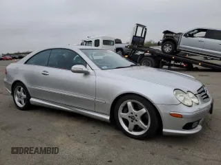 2004 Mercedes-Benz CLK 500 with VIN WDBTJ75J04F110990, listed as a Copart auction lot 85511414 with 251,096 mi miles and Salvage Title. Bid and sale history available at DreamBid. Image 4.