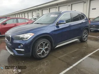 2018 BMW X1 xDrive28i z VIN WBXHT3C30J5L34182, wystawiony jako Copart lot #51715635 z przebiegiem 35 940 mil mil oraz Szkoda całkowita • Salvage title. Historia ofert i sprzedaży dostępna na DreamBid. Obrazek 1.