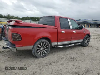 2003 Ford F-150 XLT with VIN 1FTRW07643KB48614, listed as a Copart auction lot 51895905 with 157,290 mi miles and Salvage Title. Bid and sale history available at carsss.com. Image 3.