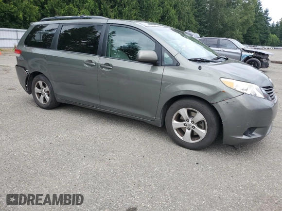 2011 Toyota Sienna LE AAS with VIN 5TDKK3DCXBS126391, listed as a Copart auction lot 62604005 with 252,346 mi miles and Salvage title. Bid and sale history available at DreamBid. Image 4.