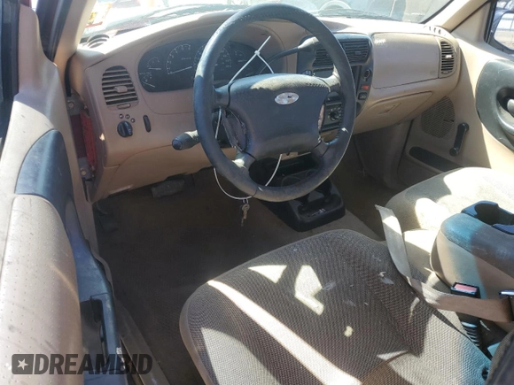 2002 Ford Ranger XL Fleet with VIN 1FTZR45E12TA11258, listed as a Copart auction lot 46797715 with 219,473 mi miles and Salvage Title. Bid and sale history available at DreamBid. Image 8.