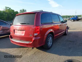 2014 Dodge Grand Caravan SXT z VIN 2C4RDGCG7ER479107, wystawiony jako IAAI lot #42155931 z przebiegiem 174 473 mil mil oraz . Historia ofert i sprzedaży dostępna na DreamBid. Obrazek 4.