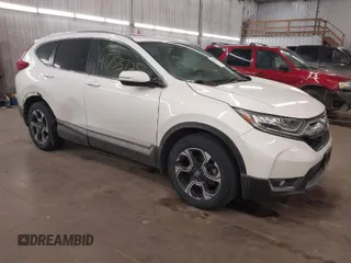 2017 Honda CR-V Touring with VIN 2HKRW2H94HH685350, listed as a IAAI auction lot 41753725 with 75,749 mi miles. Bid and sale history available at carsss.com. Image 1.