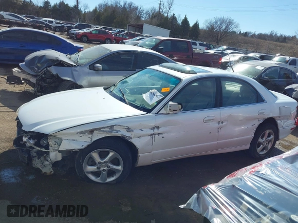 2002 Mazda Millenia S with VIN JM1TA222821725749, listed as a IAAI auction lot 41662948 with 165,088 mi miles and . Bid and sale history available at DreamBid. Image 14.