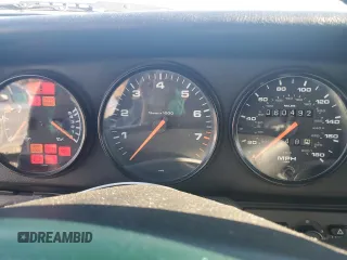 1996 Porsche 911 with VIN WP0DA2996TS385231, listed as a Copart auction lot 83699964 with 60,492 mi miles and Salvage title. Bid and sale history available at DreamBid. Image 9.