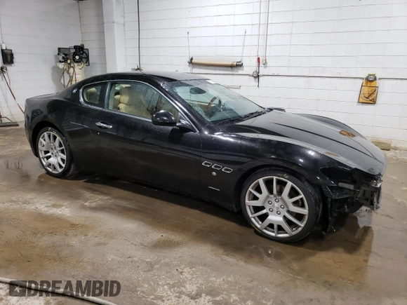 2009 Maserati GranTurismo с VIN ZAMGJ45A190042805, выставлен на аукционе Copart как лот 70785674 с пробегом 71 810 миль миль и Списание • Salvage title. История ставок и продаж доступна на DreamBid. Изображение 4.