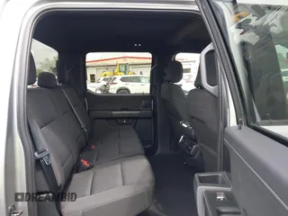 2023 Ford F-150 XL with VIN 1FTEW1C53PFC27546, listed as a IAAI auction lot 42123401 with 53,881 mi miles. Bid and sale history available at carsss.com. Image 8.