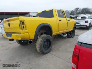 2014 Ram 2500 Tradesman with VIN 3C6UR5CLXEG298593, listed as a IAAI auction lot 41642473 with 138,000 mi miles. Bid and sale history available at carsss.com. Image 4.