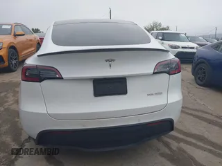 2022 Tesla Model Y Performance with VIN 7SAYGDEF0NF400560, listed as a IAAI auction lot 41783912 with 36,513 mi miles and . Bid and sale history available at DreamBid. Image 16.