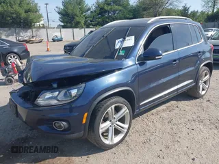 2014 Volkswagen Tiguan S z VIN WVGBV3AX7EW545538, wystawiony jako IAAI lot #42083281 z przebiegiem 129 227 mil mil oraz . Historia ofert i sprzedaży dostępna na DreamBid. Obrazek 17.