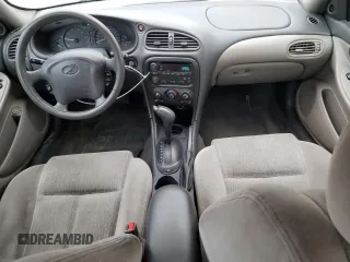 2002 Oldsmobile Alero GL1 z VIN 1G3NL52E52C225101, wystawiony jako Copart lot #44062285 z przebiegiem 92 243 mil mil oraz Szkoda całkowita • Salvage title. Historia ofert i sprzedaży dostępna na DreamBid. Obrazek 8.