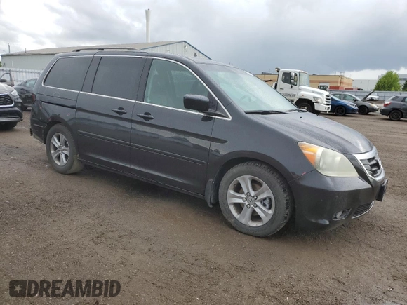 2009 Honda Odyssey Touring with VIN 5FNRL38809B503357, listed as a Copart auction lot 58035914 with 191,671 mi miles and Salvage Title. Bid and sale history available at carsss.com. Image 4.
