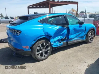 2023 Ford Mustang Mach-E Premium with VIN 3FMTK3R73PMA66134, listed as a IAAI auction lot 42103326 with 13,874 mi miles and . Bid and sale history available at DreamBid. Image 4.