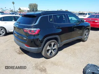 2017 Jeep Compass Latitude with VIN 3C4NJCBB6HT605934, listed as a IAAI auction lot 41846329 with 145,275 mi miles and . Bid and sale history available at DreamBid. Image 4.