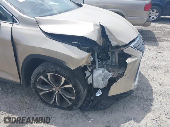 2017 Lexus RX 350 z VIN 2T2BZMCA5HC099468, wystawiony jako IAAI lot #42236279 z przebiegiem 150 005 mil mil oraz . Historia ofert i sprzedaży dostępna na DreamBid. Obrazek 6.