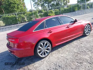 2014 Audi A6 Prestige with VIN WAUHGAFC6EN060054, listed as a IAAI auction lot 42006061 with 42,381 mi miles and . Bid and sale history available at DreamBid. Image 4.