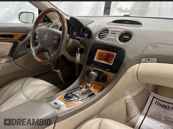 2007 Mercedes-Benz SL 550 with VIN WDBSK71FX7F129349, listed as a Copart auction lot 60161885 with 108,178 mi miles and Clean title. Bid and sale history available at DreamBid. Image 5.