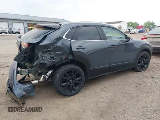 2023 Mazda CX-30 S Carbon Edition with VIN 3MVDMBCM4PM577619, listed as a IAAI auction lot 42219801 with 24,784 mi miles and . Bid and sale history available at DreamBid. Image 6.