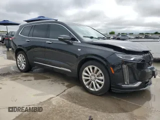 2020 Cadillac XT6 FWD Premium Luxury with VIN 1GYKPCRS9LZ148944, listed as a Copart auction lot 54406745 with 64,086 mi miles and Salvage title. Bid and sale history available at DreamBid. Image 4.