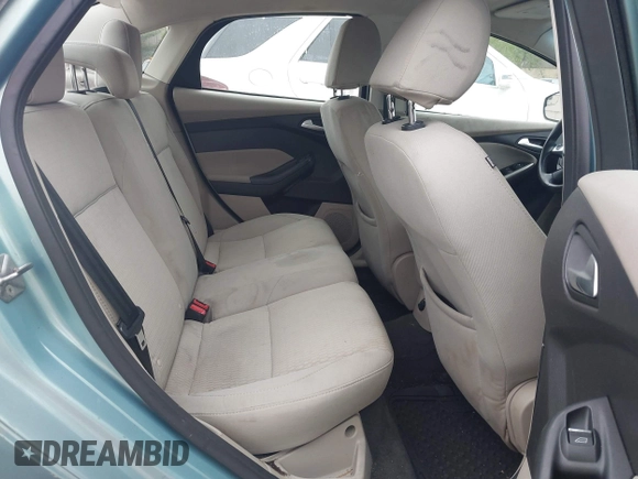 2012 Ford Focus SEL with VIN 1FAHP3H29CL430964, listed as a IAAI auction lot 42186057 with 122,279 mi miles. Bid and sale history available at carsss.com. Image 8.