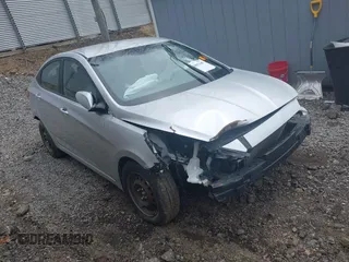 2014 Hyundai Accent GLS with VIN KMHCT4AE5EU597325, listed as a IAAI auction lot 42005445 with 1 mi miles. Bid and sale history available at carsss.com. Image 1.