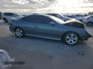2005 Pontiac GTO with VIN 6G2VX12U75L457697, listed as a Copart auction lot 84683564 with 57,504 mi miles and Salvage Title. Bid and sale history available at carsss.com. Image 4.