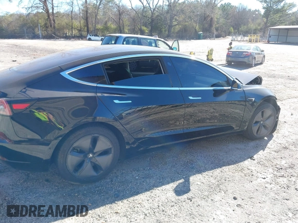 2019 Tesla Model 3 Mid Range with VIN 5YJ3E1EA2KF306286, listed as a IAAI auction lot 41699127 with 56,249 mi miles and . Bid and sale history available at DreamBid. Image 13.
