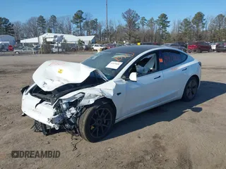 2022 Tesla Model 3 with VIN 5YJ3E1EA5NF315004, listed as a IAAI auction lot 41429800 with Not Provided miles. Bid and sale history available at carsss.com. Image 2.