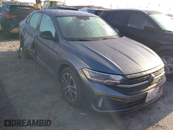 2023 Volkswagen Jetta Sport z VIN 3VWBM7BU5PM035014, wystawiony jako IAAI lot #41818798 z przebiegiem 21 202 mil mil oraz . Historia ofert i sprzedaży dostępna na DreamBid. Obrazek 1.