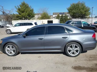 2013 Volkswagen Passat SE w/Sunroof with VIN 1VWBM7A30DC125919, listed as a IAAI auction lot 41759051 with 112,952 mi miles. Bid and sale history available at carsss.com. Image 14.