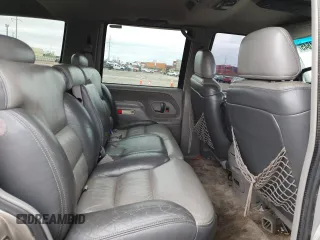 2000 Chevrolet Tahoe Z71 with VIN 1GNEK13R1YR116418, listed as a Copart auction lot 50961645 with 239,452 mi miles and Salvage title. Bid and sale history available at DreamBid. Image 10.
