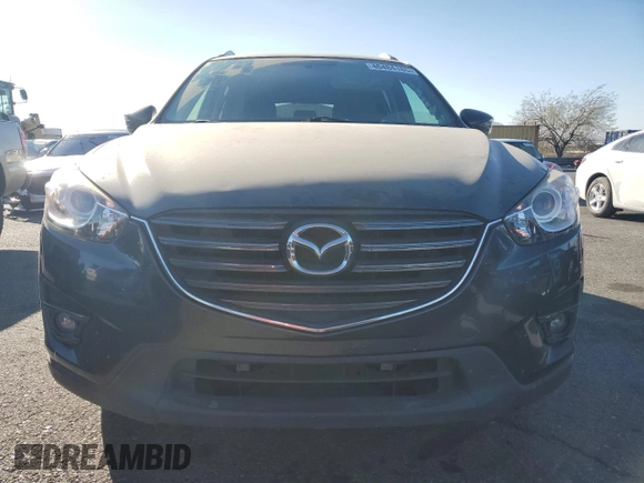 2016 Mazda CX-5 Touring with VIN JM3KE2CYXG0906293, listed as a Copart auction lot 46484185 with 89,544 mi miles and Salvage Title. Bid and sale history available at carsss.com. Image 5.