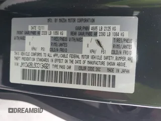 2012 Mazda 5 Sport with VIN JM1CW2BL6C0134921, listed as a IAAI auction lot 42290476 with 128,490 mi miles and . Bid and sale history available at DreamBid. Image 9.