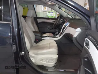 2016 Cadillac SRX Luxury Collection z VIN 3GYFNEE38GS565721, wystawiony jako IAAI lot #41963005 z przebiegiem 87 005 mil mil oraz . Historia ofert i sprzedaży dostępna na DreamBid. Obrazek 5.