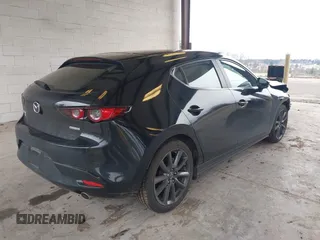 2019 Mazda Mazda3 Hatchback with VIN JM1BPBJM1K1134076, listed as a IAAI auction lot 41643876 with 69,641 mi miles. Bid and sale history available at carsss.com. Image 4.