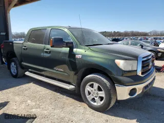 2011 Toyota Tundra 4WD Truck with VIN 5TFDW5F10BX171015, listed as a Copart auction lot 48556335 with 153,262 mi miles and Salvage Title. Bid and sale history available at carsss.com. Image 4.